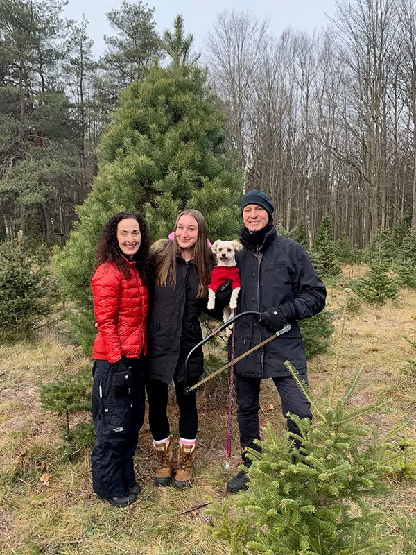Dr. Skalenda outdoors with his family and dog Chloe